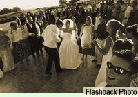 Bride and Groom dancing by Flashback Photography